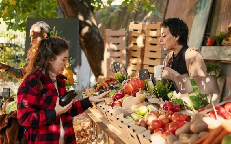 friends sampling food at a farmers market, Sydney experience, August 2024, Australia